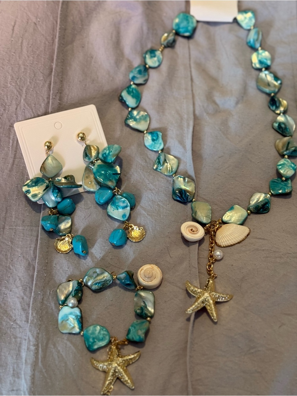 Gold Starfish Charm Necklace with Turquoise Shell Beads